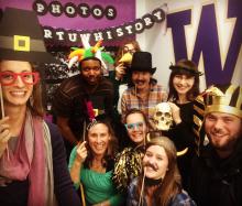 History Fellows with photo booth props