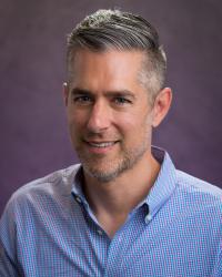 Professor Adam Warren